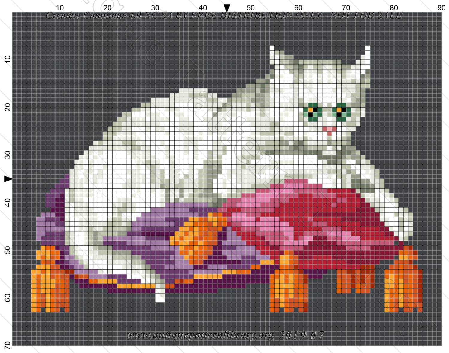 I-II006 White cat on red and purple pillows